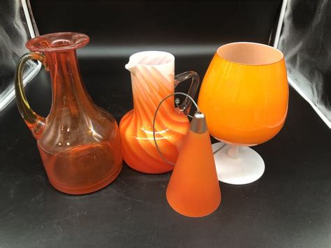 Urban Auctions Assorted Orange Glassware