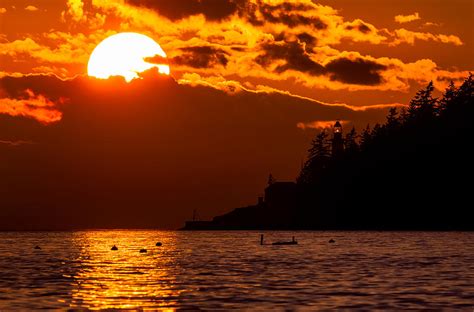 Sunset Over Point Atkinson Lighthouse Photograph By Alexis Birkill Pixels