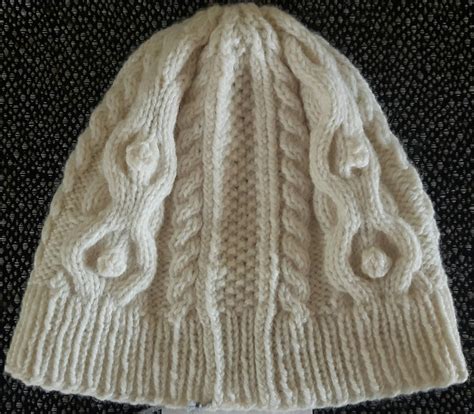 traditional cabled aran hat knitting pattern this man knits