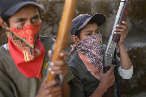 Mexican Children Take Up Arms In The Fight Against Drug Gangs