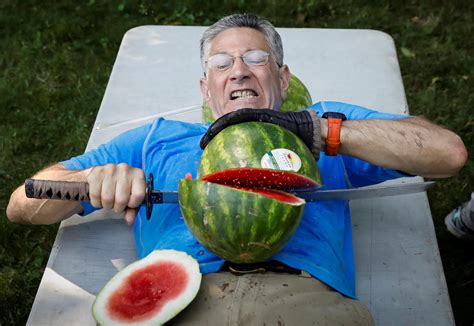 man slices 27 watermelons in half on stomach sets guinness world record cbs news