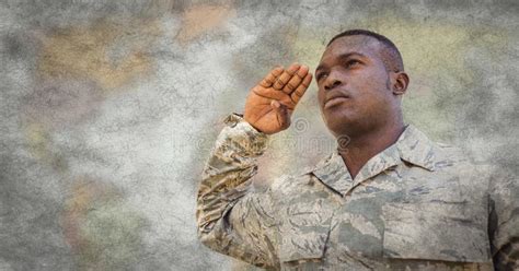 Soldier Saluting Against Blurry Map Grunge Overlay Stock Photos Free