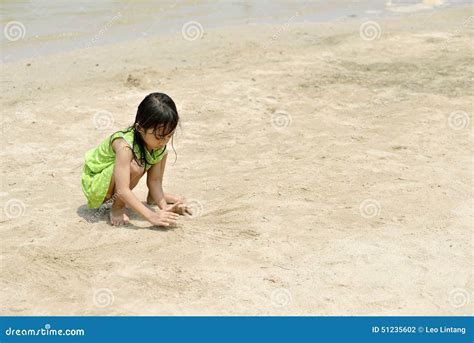 Asian Girl Playing On The Beach In The Summertime Stock Photo Image
