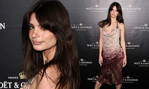 Emily Ratajkowski Puts On A Busty Display At Moet And Chandon Holiday