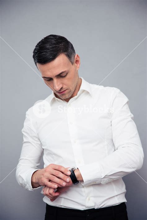 Businessman Looking On Wristwatch Royalty Free Stock Image Storyblocks