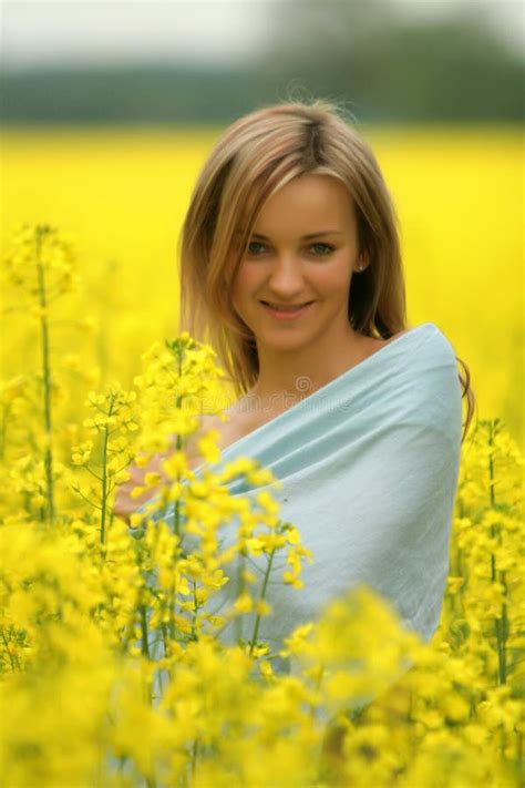 Girl In Yellow Flowers Field Stock Image Image Of Close Looking 3841003