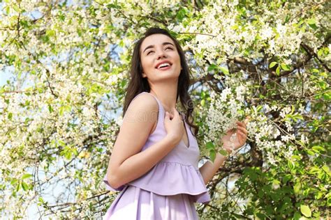 Beautiful Young Woman Near Blossoming Tree On Sunny Spring Day Stock Image Image Of Beautiful