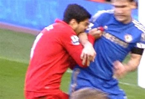 Liverpools Luis Suarez Bites Chelseas Branislav Ivanovic