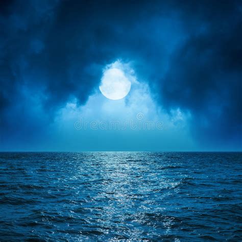 Full Moon In Clouds Over Dark Sea Stock Image Image Of Moon Lake
