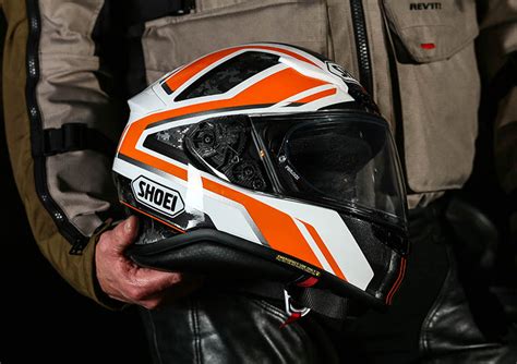 The flipup mechanism is very smooth and it just clicks into place with almost zero effort. Shoei NXR sports motorcycle helmet review - SBSMag