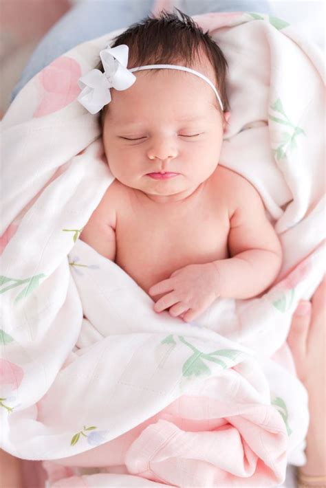 Adorable Swaddled Newborn Girl In Lifestyle Home Newborn Session In