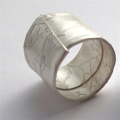 The turquoise designer pendant is available in various designs that meet both the traditional as well as contemporary choices of women. Silver wrapped blossom ring | Contemporary Rings by ...