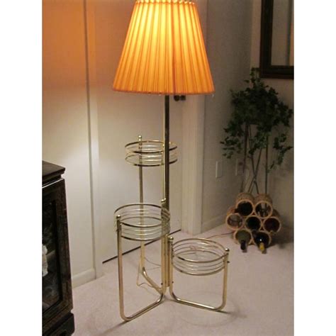 The slate shelf + shape bracket set is 24 inches wide, 8 inches deep, and 6.5 inches high. Vintage Brass & Glass Tiered Shelf Floor Lamp | Chairish