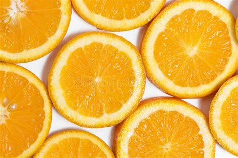 Round Slices Of Juicy Orange On White Background Stock Photo Image Of