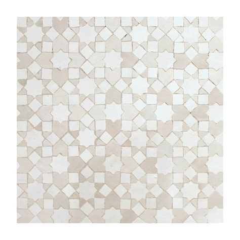 Kitchen featuring a custom stainless hood on book matched soap stone back splash. White Moroccan kitchen tile | White Moorish Tiles
