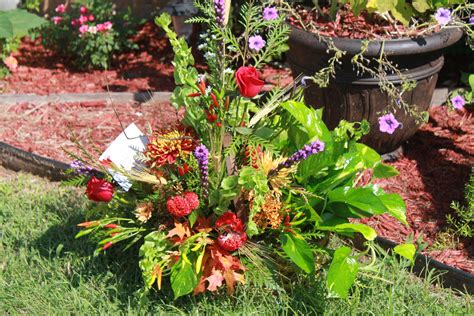 Maybe you would like to learn more about one of these? Basket spray designed by the little shop of flowers in ...
