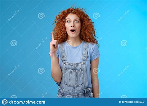 Impressed Excited Cute Redhead Curly Female European Student Wear Denim