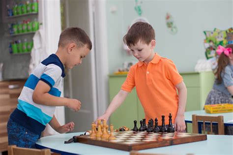 Preschool Boys Play Chess Stock Photo Download Image Now Chess