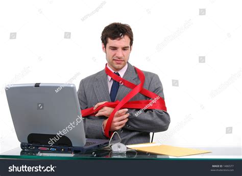 Businessman Tied Up In Red Tape Stock Photo 1486577 Shutterstock