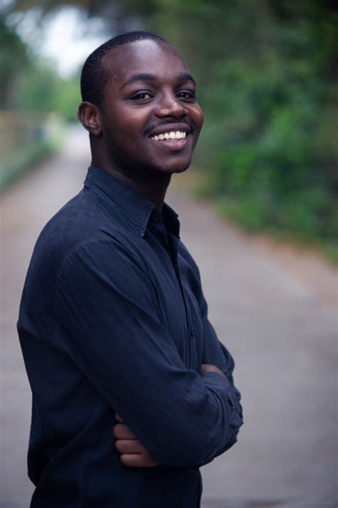 Portrait Of A Handsome African Man Smiling Premium Photo