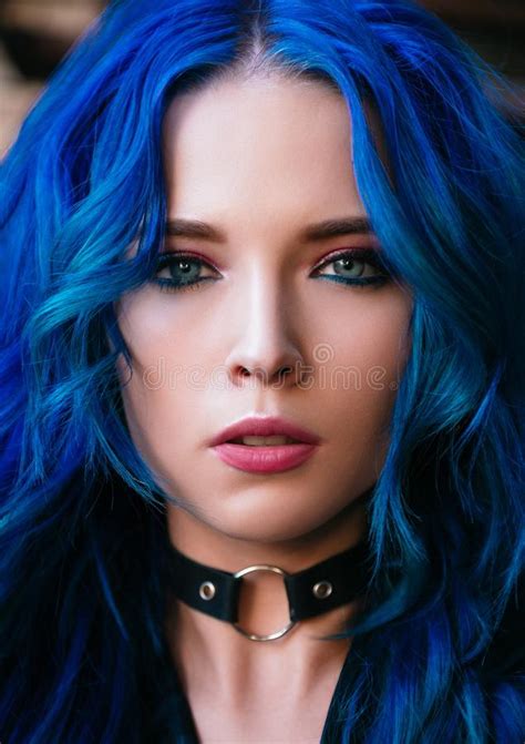 Closeup Portrait Of Blue Haired Beautiful Young Girl