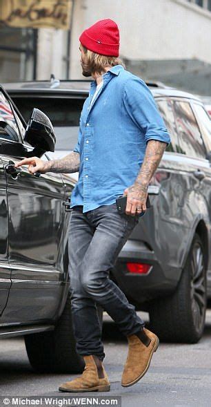 David Beckham Puts On Suave Appearance At Victorias Store David