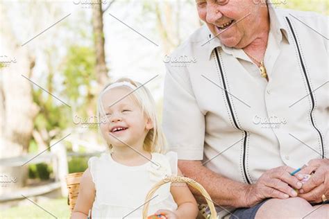 Grandpa And Granddaughter On Easter High Quality People Images ~ Creative Market