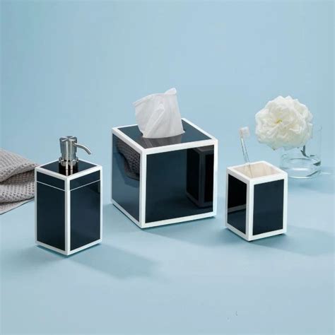 Three Different Types Of Bathroom Accessories On A Blue Surface With A