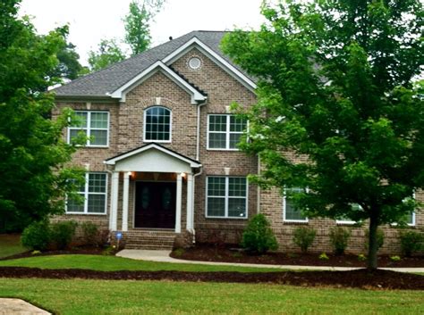 Image result for dark brown brick. Traditional Home - Brown Brick exterior with doors painted ...
