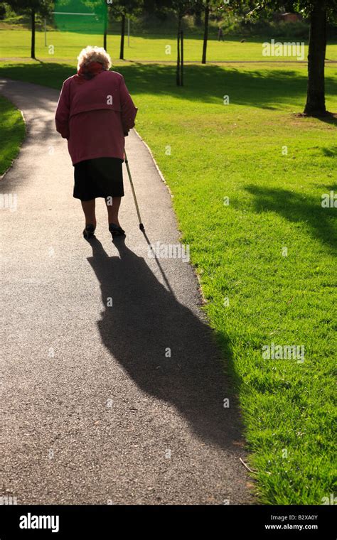 Old Lady Walking Stick Hi Res Stock Photography And Images Alamy
