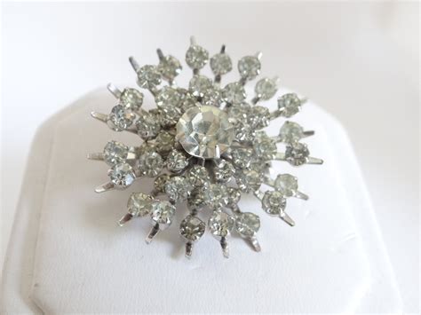 Vintage Clear Faceted Round Glass Rhinestone Brooch Pin On A Silver Tone Setting Is An Elegant