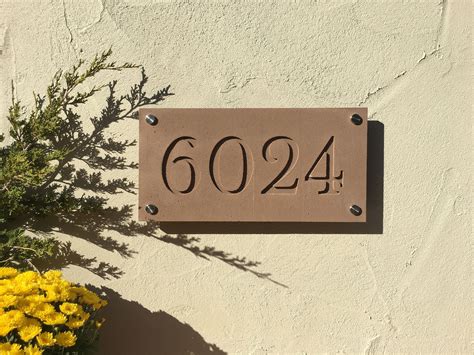 It has a dense, stonelike texture that is highly durable and can be reinforced and color matched. Modern house numbers.Cast in stone address plaque.Modern ...