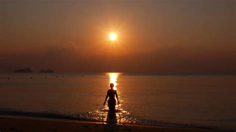 Woman Walking Towards Sunset In Sea Slow Stock Footage Sbv 304417828 Storyblocks