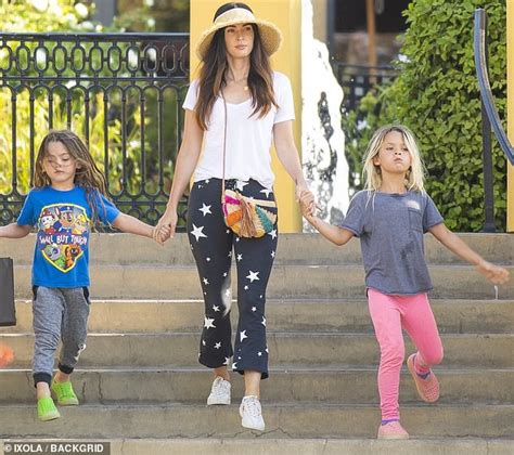 Megan Fox Exudes Hot Mama Style As She Stays Cool In An Oversized Hat