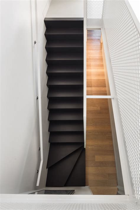 12 Black Stairs That Add A Sophisticated Touch To These
