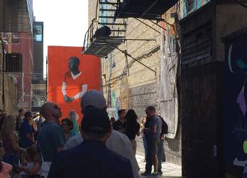 The black cat alley is an outdoor art gallery located in a private alley on the east side of milwaukee. Black Cat Alley Transforms Eastside Alley Into an Art Gallery