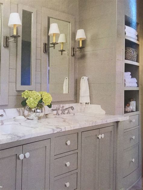 The shiplap wall has proven that it's here to stay. Gray-green bathroom vanity with shiplap walls. One color ...
