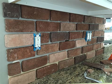 You will have a very nice addition to your home. Do-It-Yourself Brick Veneer Backsplash | Faux brick backsplash, Faux brick walls, Backsplash