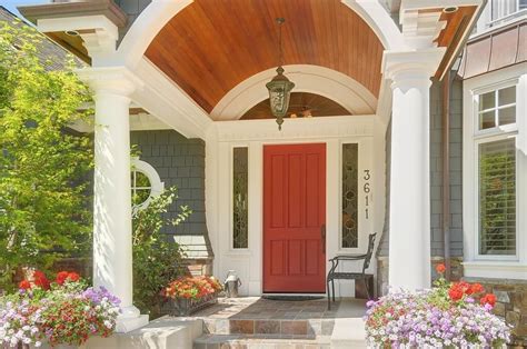 A bright red front door like on this oklahoma home provides great contrast against the brick facade. 35 Different Red Front Doors (Many Designs & Pictures)