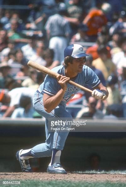 Doug Ault Of The Toronto Blue Jays Squares To Bunt Against The New