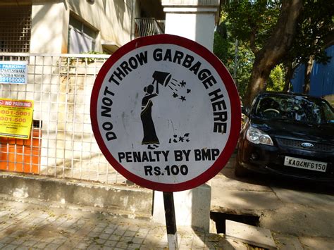 Carelessness has made people throw rubbish anywhere without thinking about the consequences of their actions. Do Not Throw Garbage Here | In Indiranagar, a sign on a ...