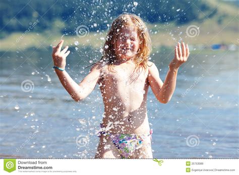 Little Girl Splashes In The Water Stock Image Image Of Jump Innocent