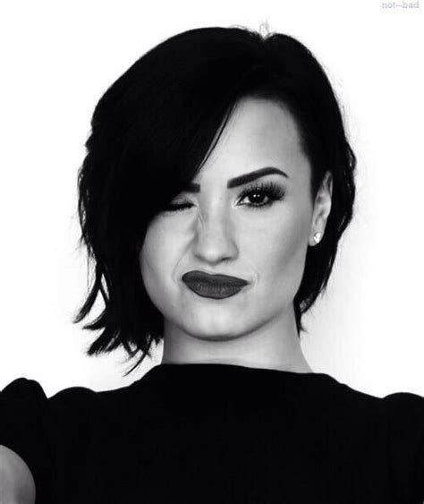 Demi is known for her glossy brunette mane. Demi lovato black and white | Demi lovato hair, Demi ...