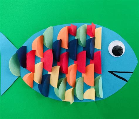 Cut the paper roll in half. Easy 3D Fish Craft for Kids - Awesomelycrafty