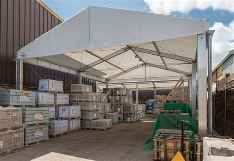 An industrial aluminum canopy can be located between two temporary, modular buildings that are close together, but they can connect permanent buildings as well. Industrial storage canopies protect stock from rain damage ...