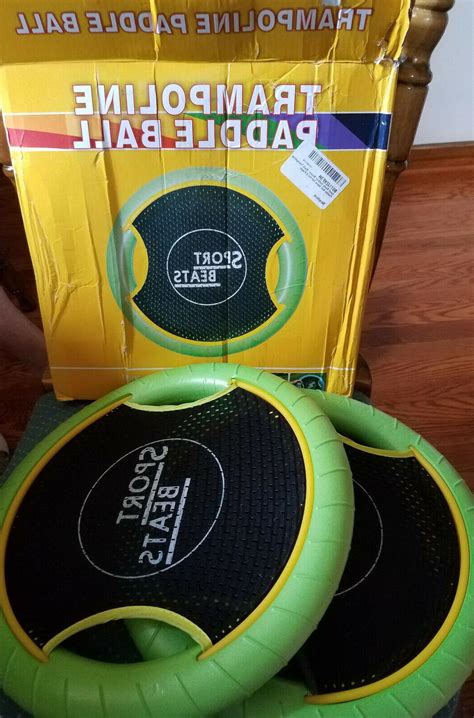 This trampoline ball game requires 1 person inside the trampoline (piggy) and 2 others outside and in opposite directions. Trampoline Paddle Ball Game 5 Pc Brand New