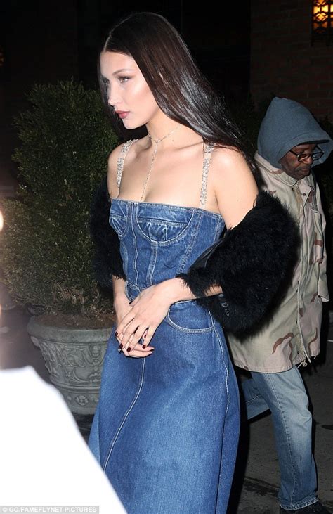 Bella Hadid Shows Off Decolletage In Low Cut Denim Dress Daily Mail