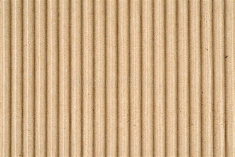 Brown Corrugated Cardboard Texture Background With Motor Oil Stain