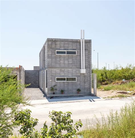 Modern concrete block house is made with low-budget scheme but really