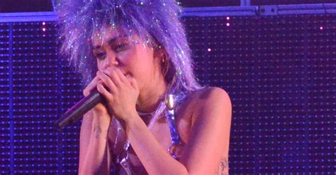 Miley Cyrus Performs Topless While Wearing A Strap On Penis Her Most